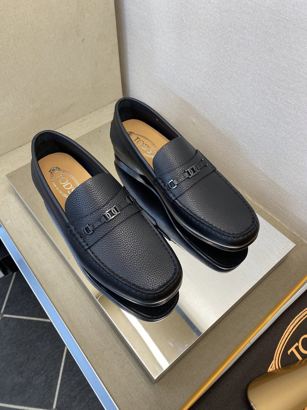 Tod's Black Leather Penny Loafers — front
