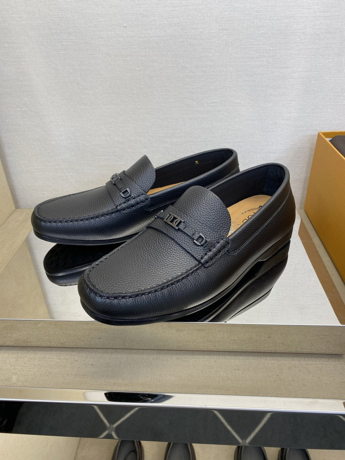 Tod's Black Leather Penny Loafers — front