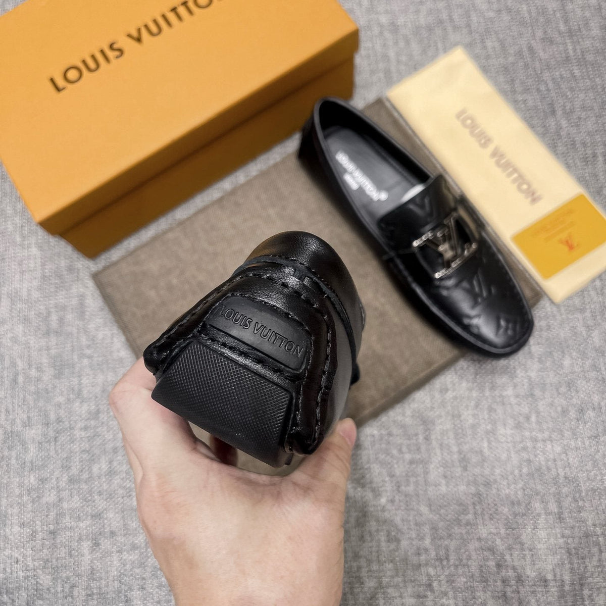 Louis Vuitton Black Metal-Accent Loafers — detail