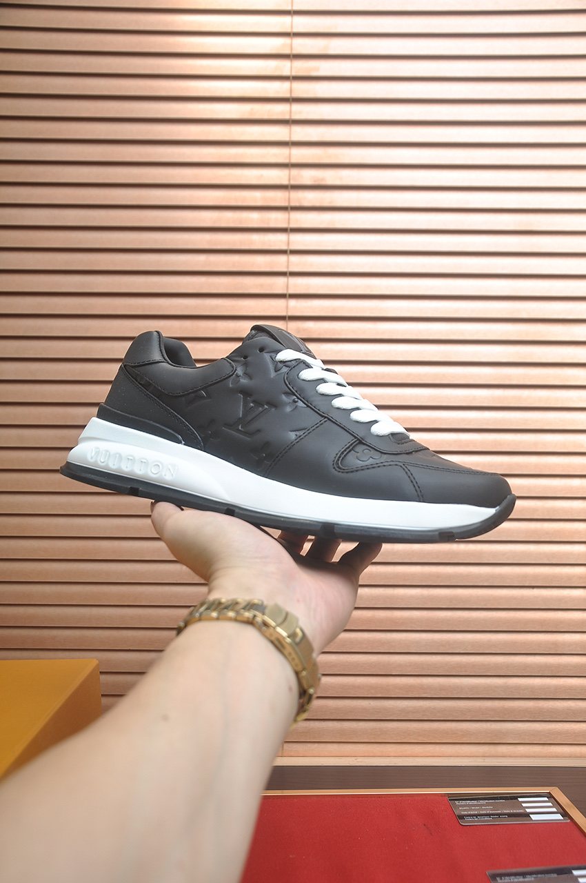 Louis Vuitton Black Embossed Low-Top Sneakers — front