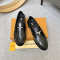 Louis Vuitton Black Embossed Leather Loafers — hero