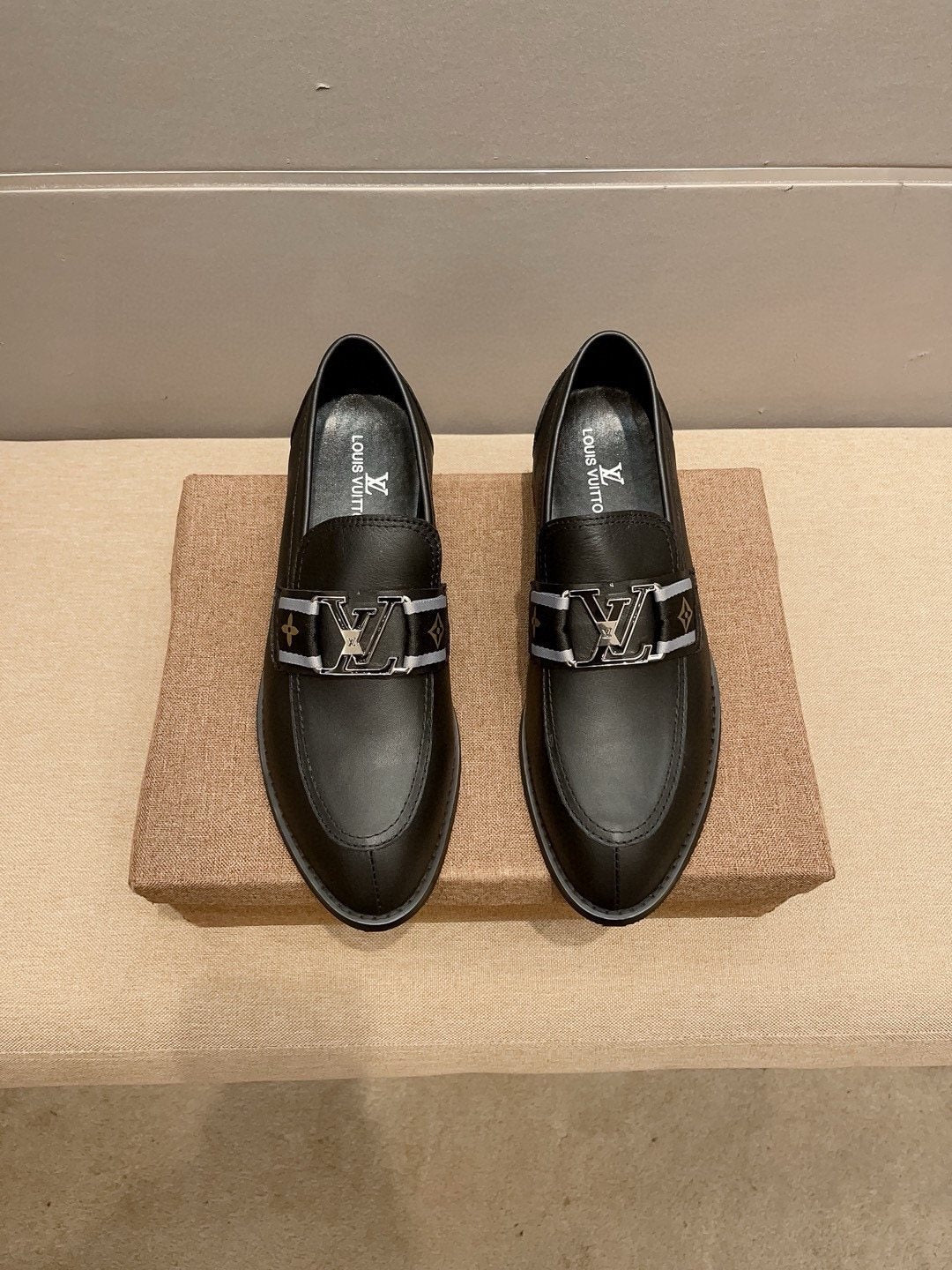 Louis Vuitton Black Buckle Loafers — hero