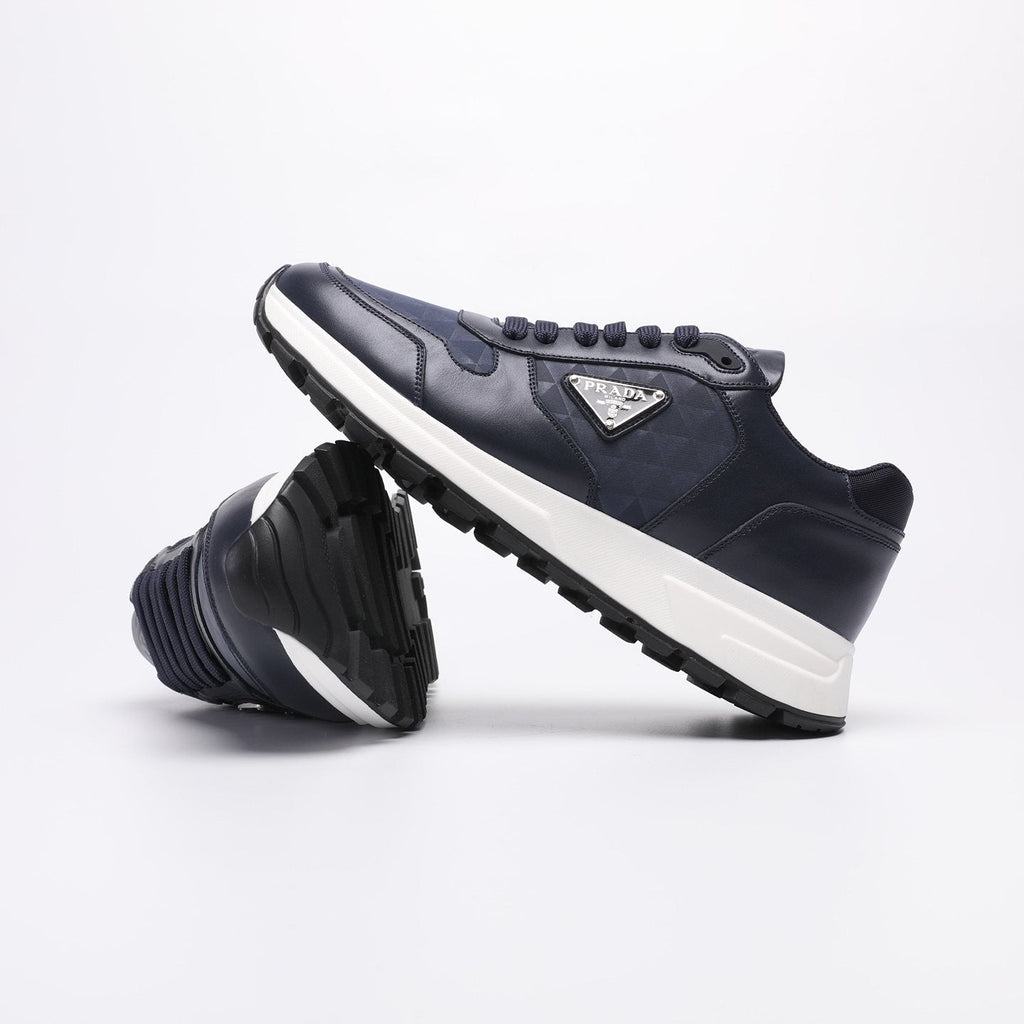 Prada Navy Textured Low-Top Sneakers — side