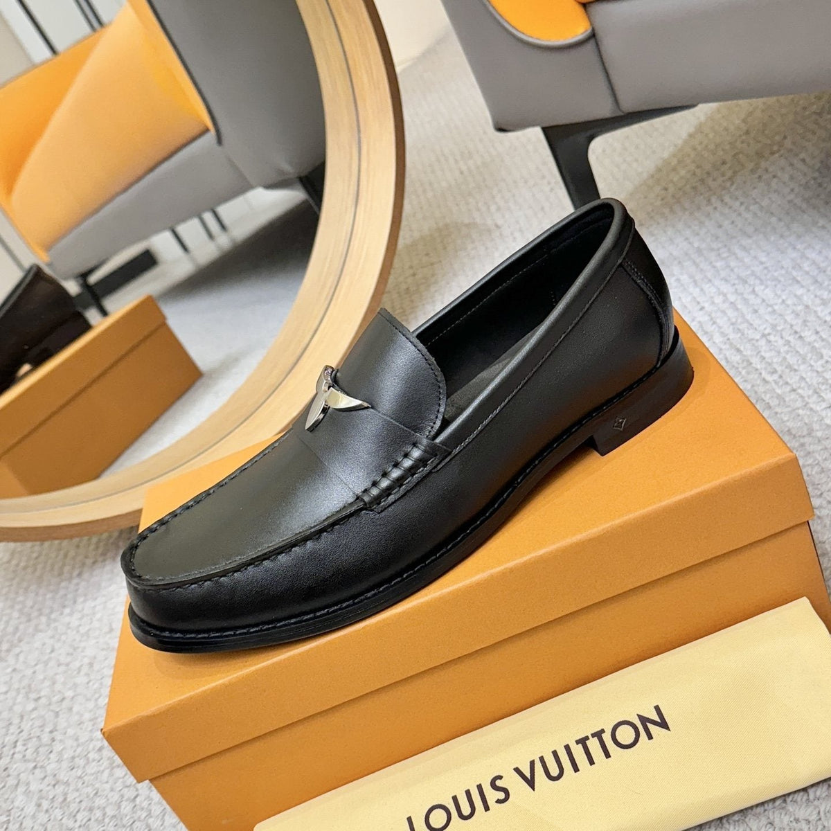 Louis Vuitton Black Metal-Accent Loafers — side