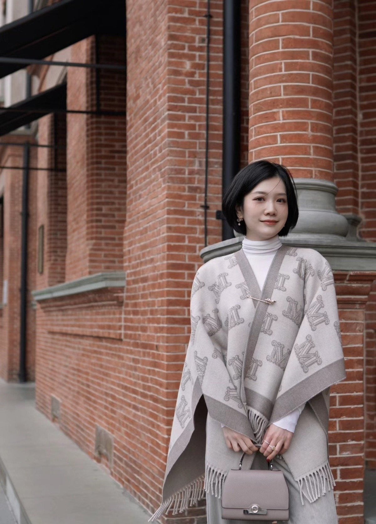 Fringed Patterned Cape — model