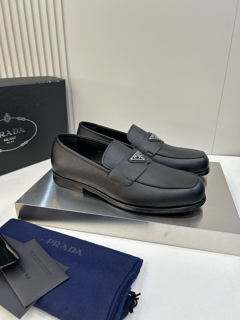 Prada Black Triangular Plaque Loafers — side