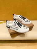White Graphic Low-Top Sneakers — hero