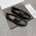 Prada Black Triangle Plaque Loafers — hero