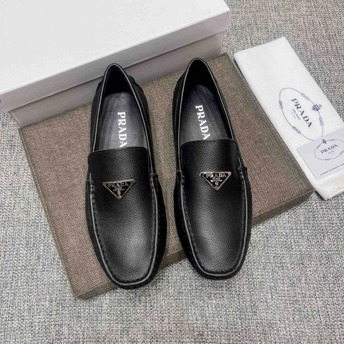 Prada Black Triangle Plaque Loafers — front