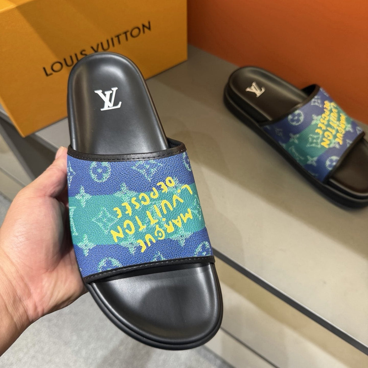 Louis Vuitton Blue Green Patterned Slide Sandals — model