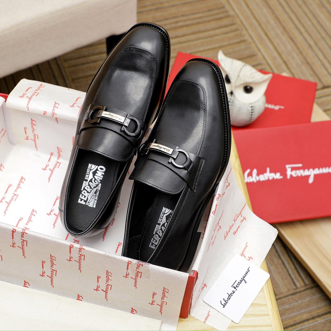 Ferragamo Black Metal Bit Loafers — front