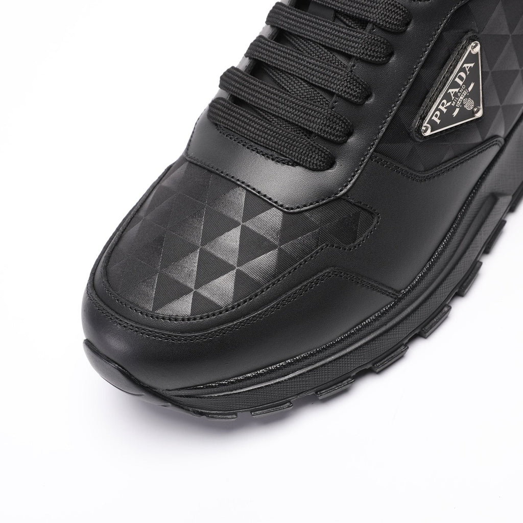 Prada Black Triangle-Plaque Sneakers — detail