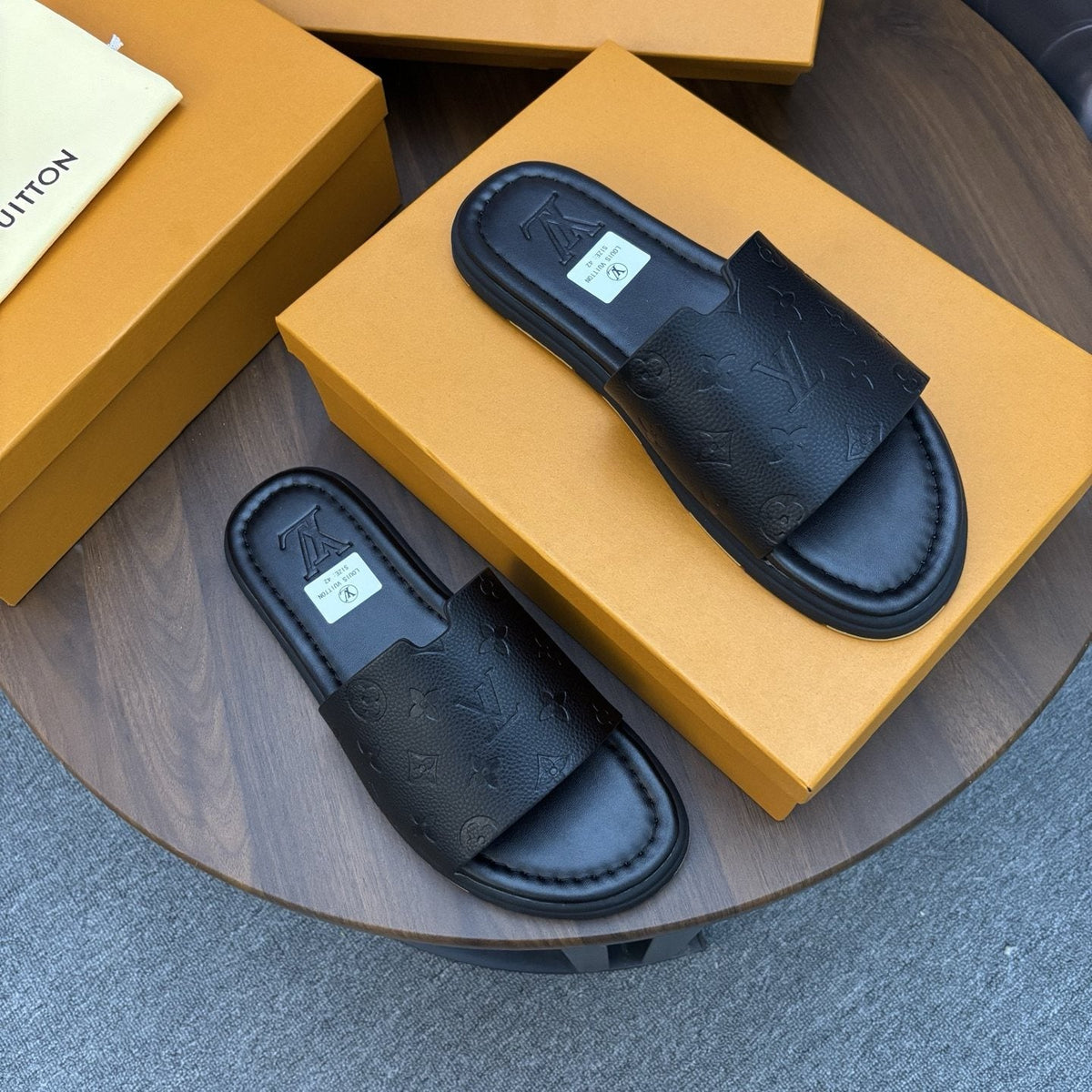Louis Vuitton Black Embossed Strap Slide Sandals — front