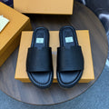 Louis Vuitton Black Embossed Strap Slide Sandals — hero