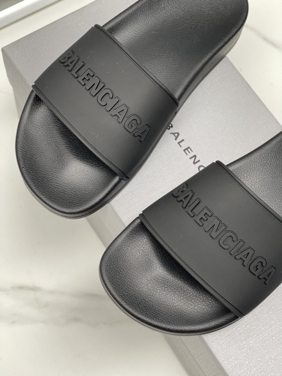 Balenciaga Black Embossed Slide Sandals — detail