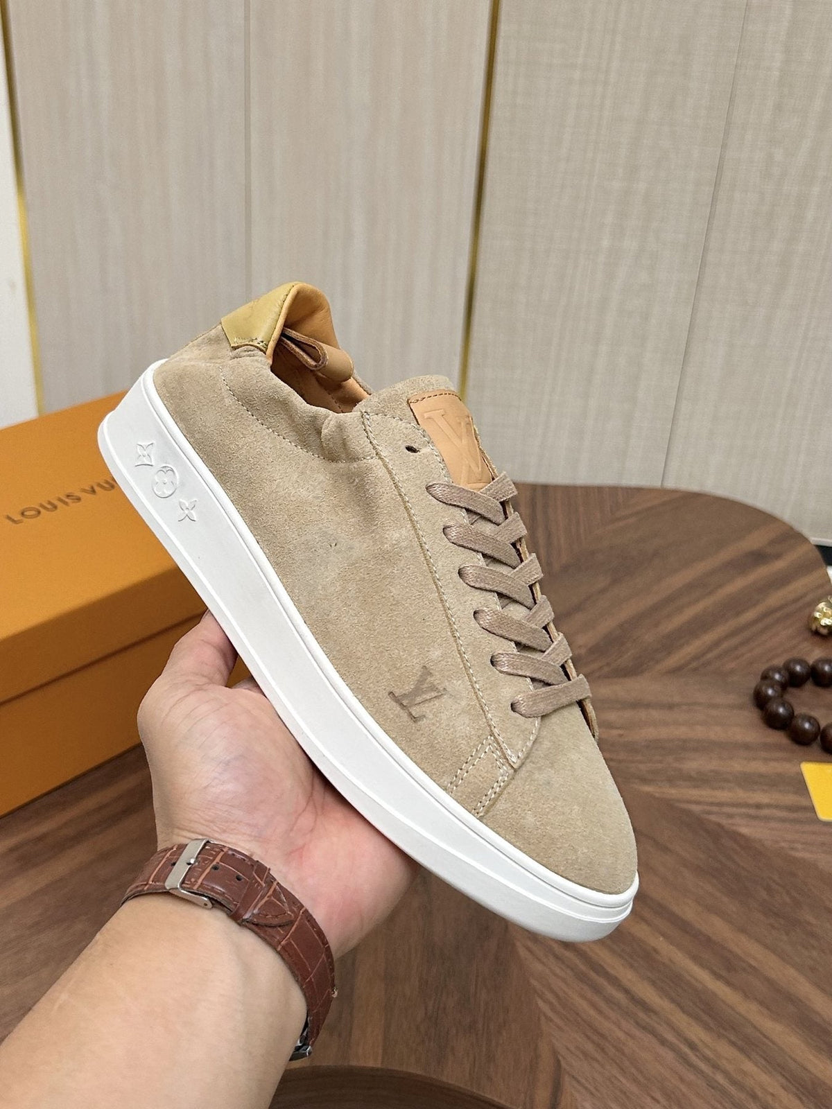 Louis Vuitton Brown Textured Low-Top Sneakers — model