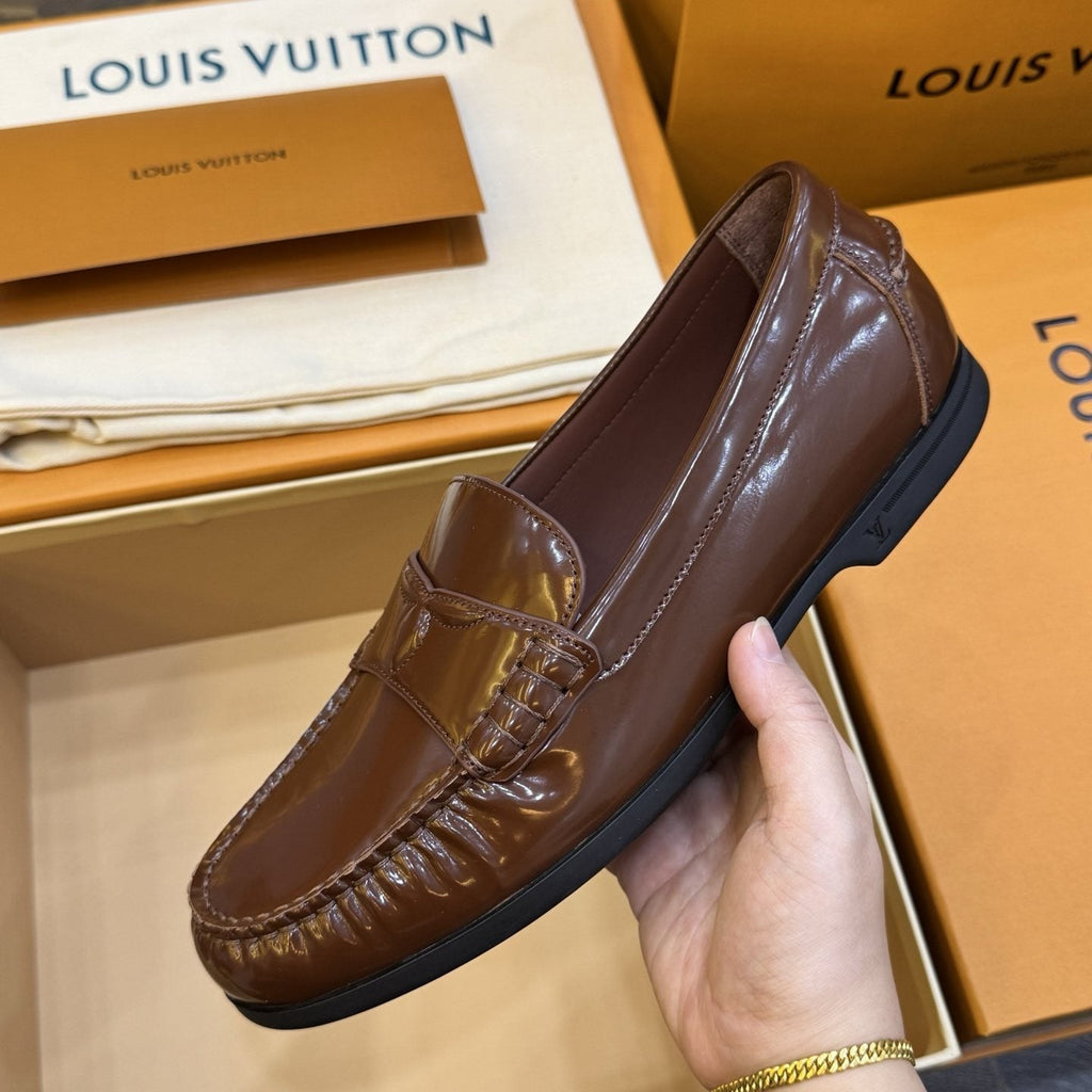 Louis Vuitton Brown Penny Loafers — model