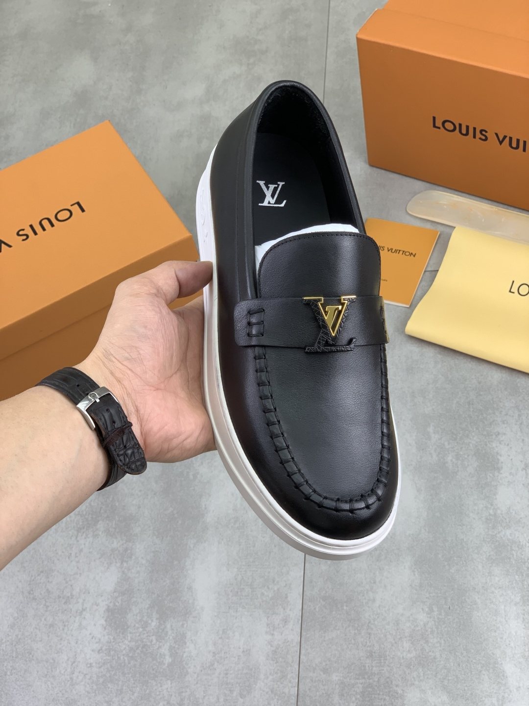 Louis Vuitton Metal Emblem Slip-On Loafers — front