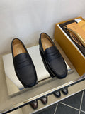 Tod's Textured Penny Loafers — hero