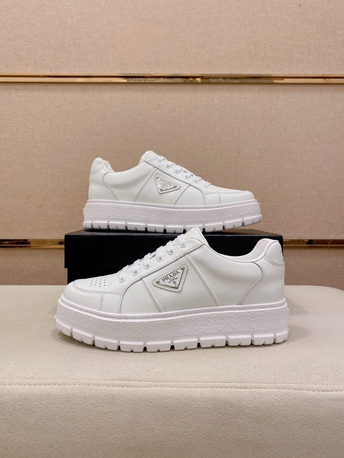 Prada Triangle Plaque Low-Top Sneakers — side