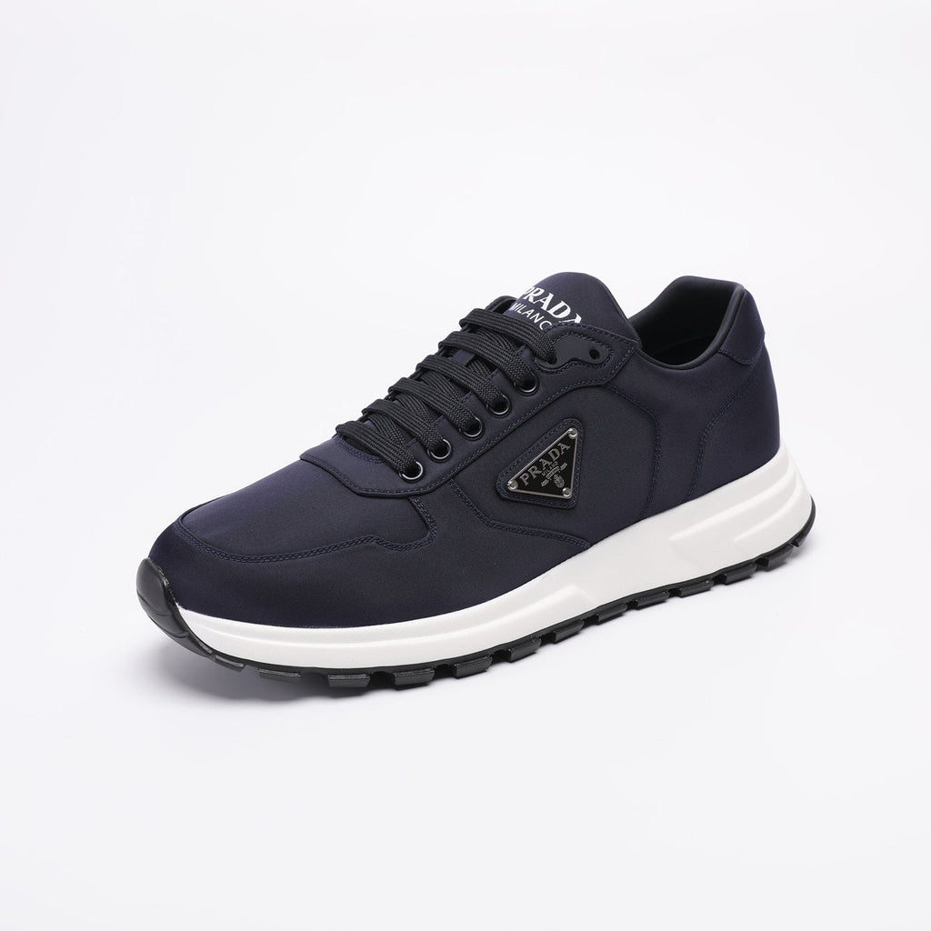 PRADA Navy Triangle Badge Sneakers — side