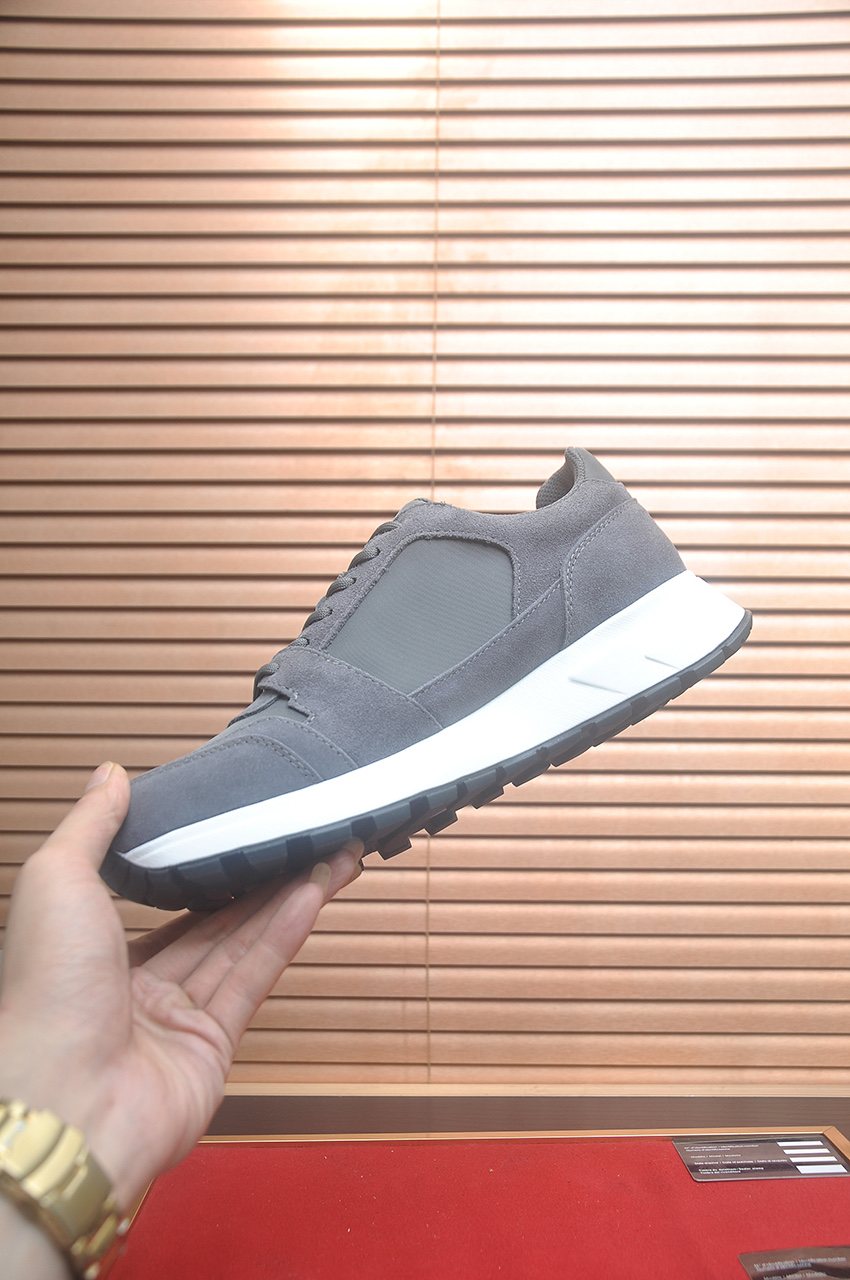 Prada Triangle Plaque Low-Top Sneakers — side