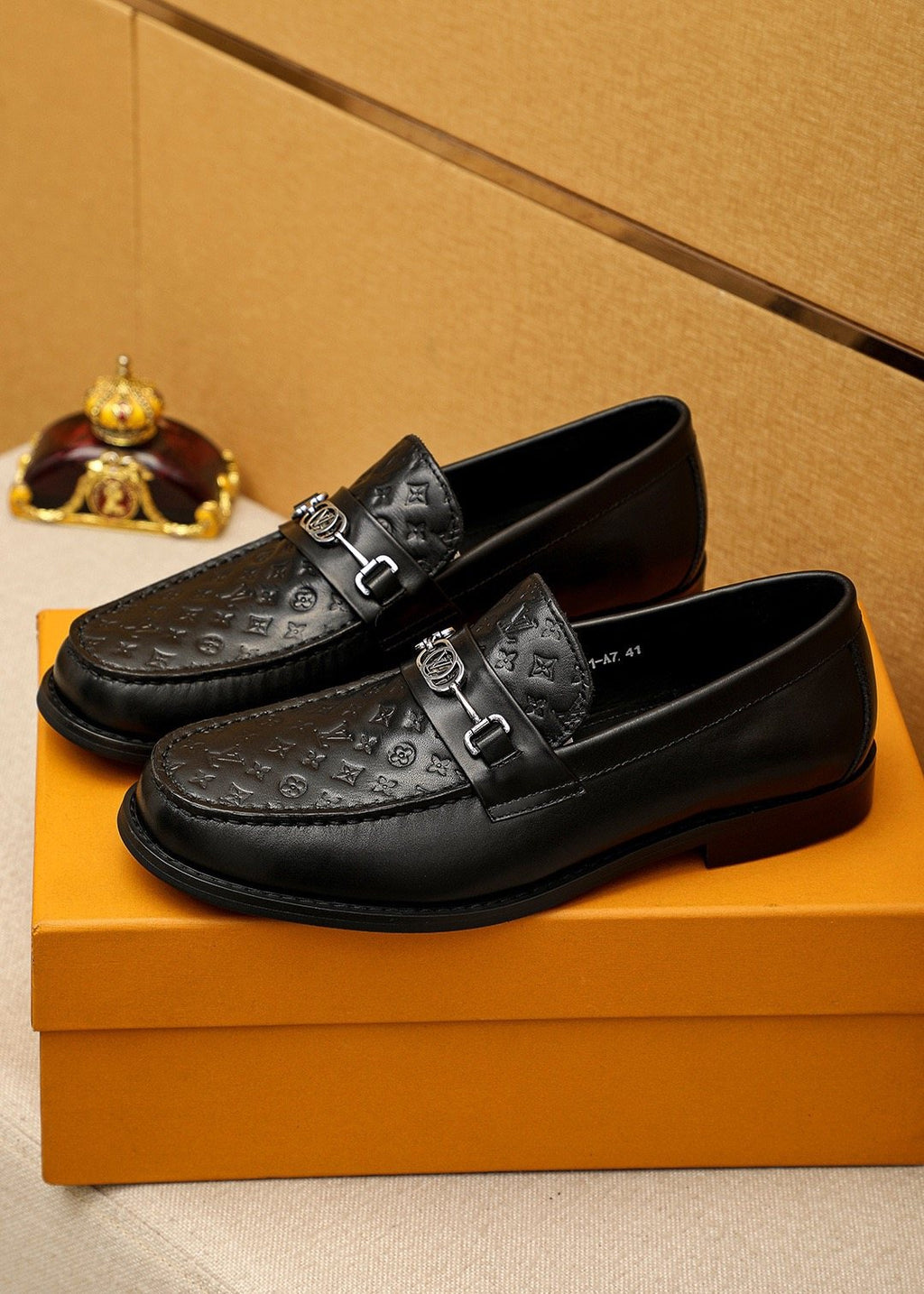 Louis Vuitton Embossed Buckle Loafers — hero