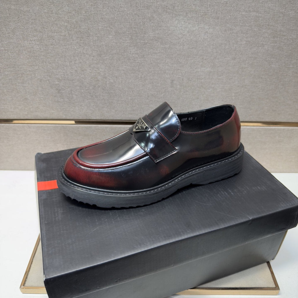 Prada Black Lug Sole Slip-On Shoes — front
