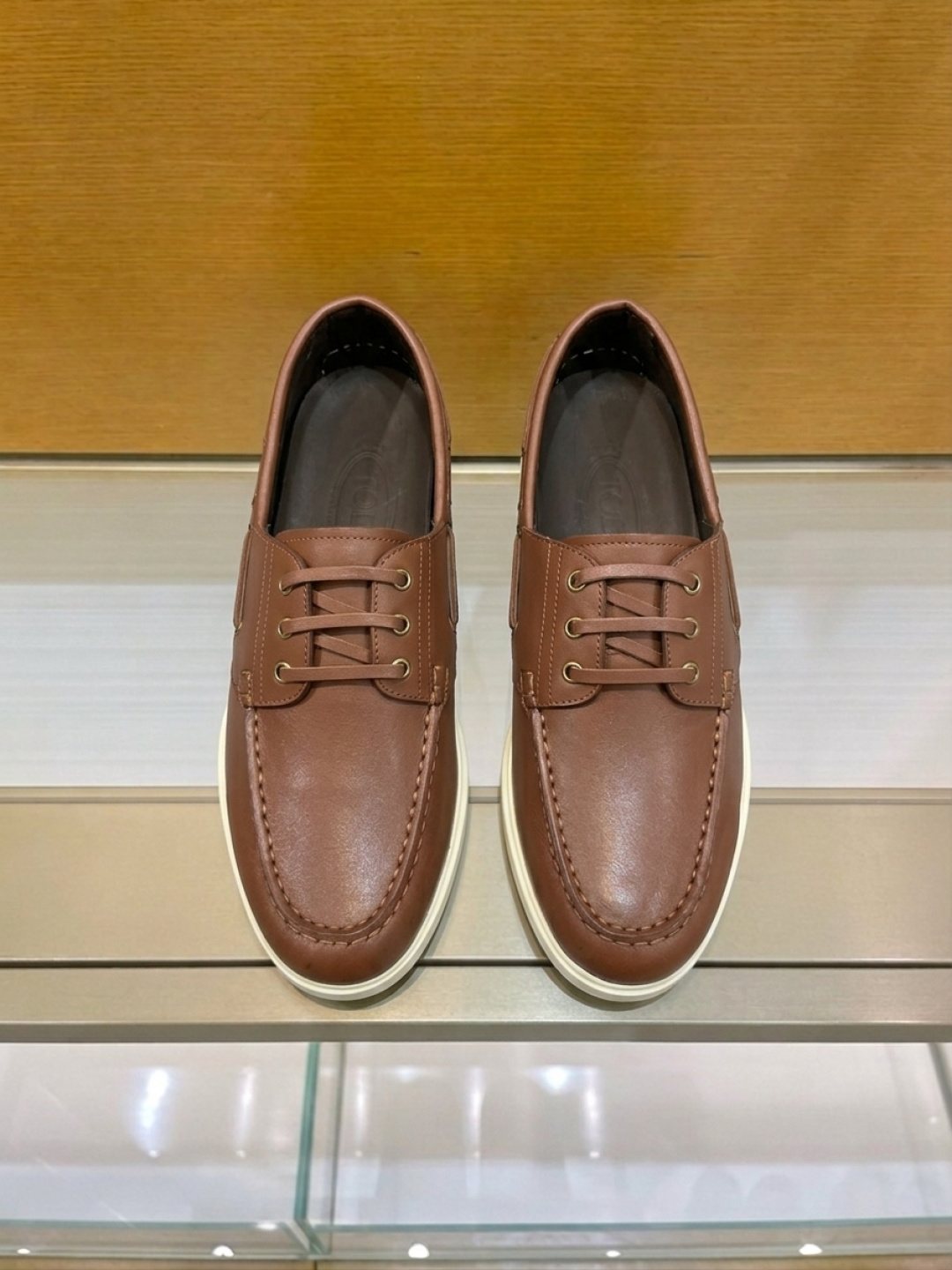 TOD'S Moc-Toe Boat Shoes — front