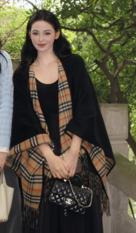 Fringed Plaid-Panel Poncho — model