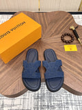 Louis Vuitton Embossed Navy Blue Slide Sandals — hero