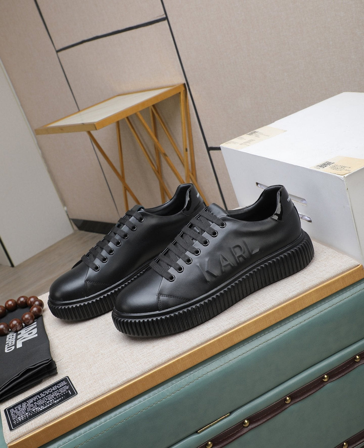 Karl Lagerfeld Embossed Logo Low-Top Sneakers — front
