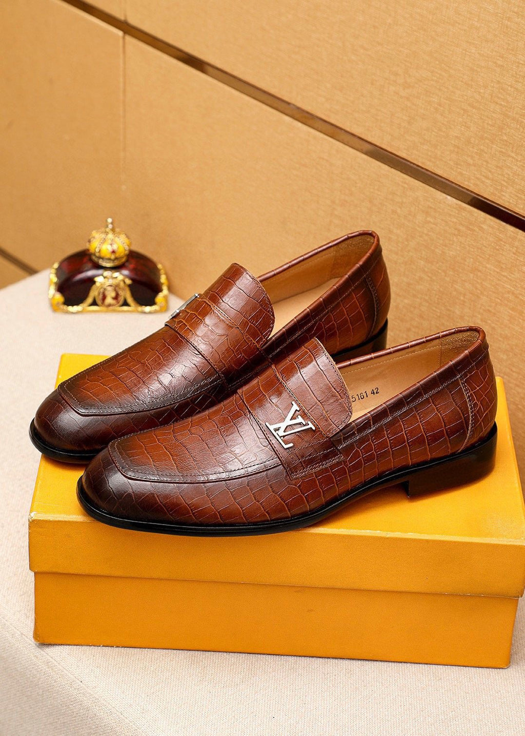 Louis Vuitton Embossed Metal-Accent Loafers — front