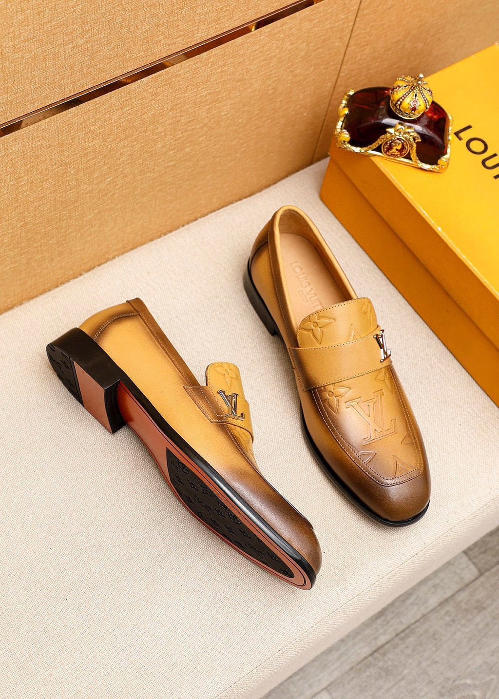 Louis Vuitton Embossed Leather Loafers — front