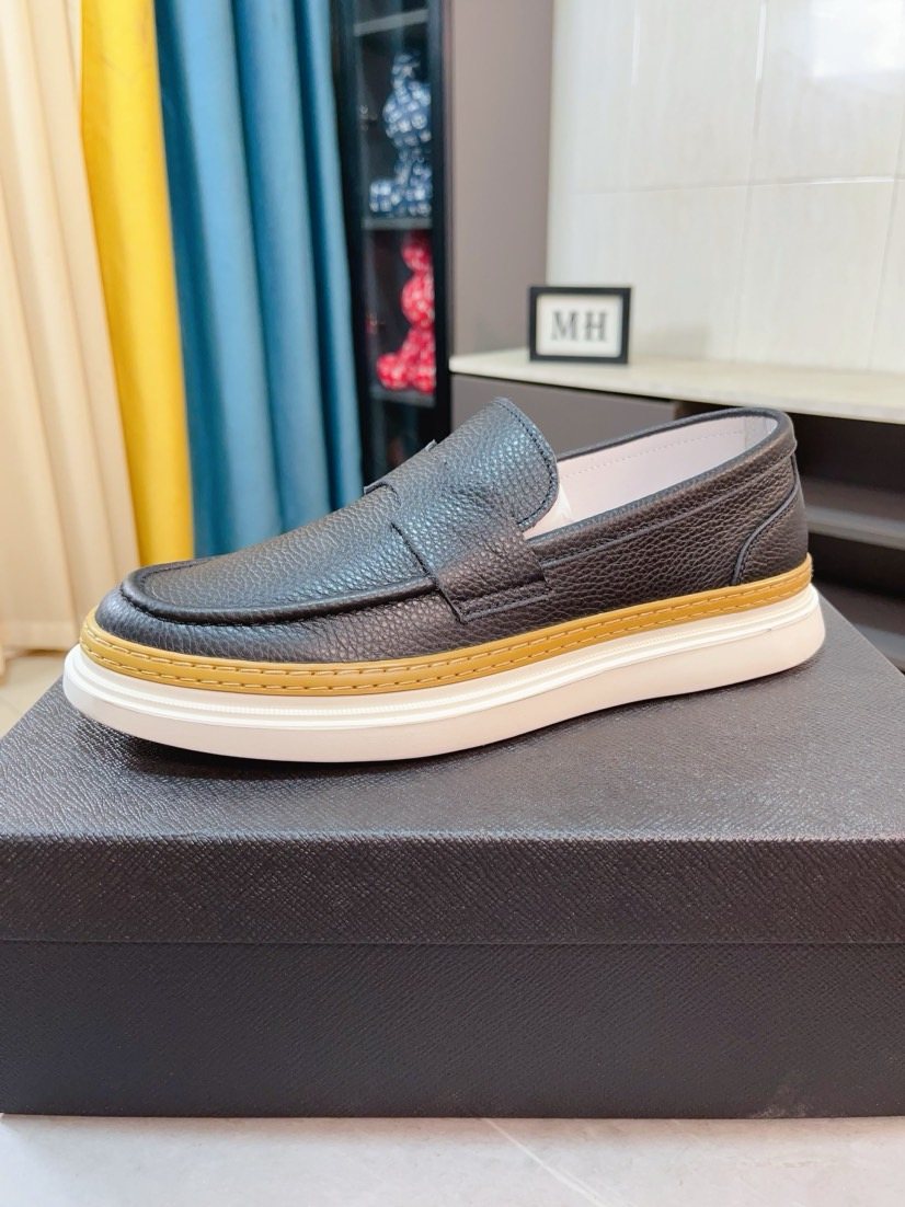 Prada Textured Slip-On Shoes — hero