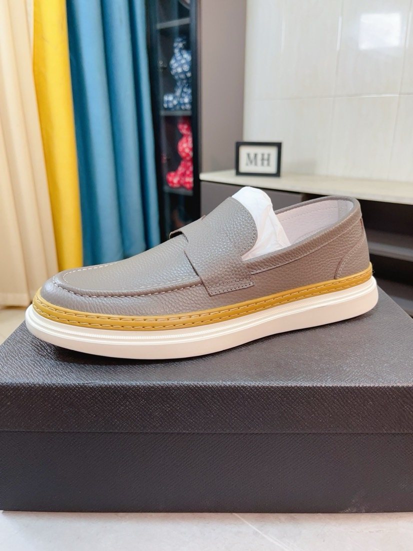 Prada Textured Slip-On Shoes — front