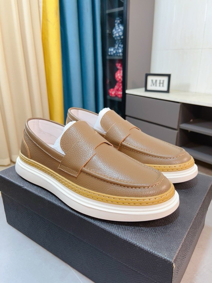 Prada Textured Slip-On Shoes — front