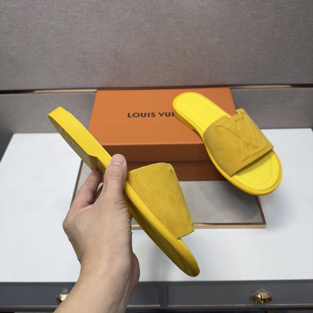 Louis Vuitton Embossed Strap Slide Sandals — model