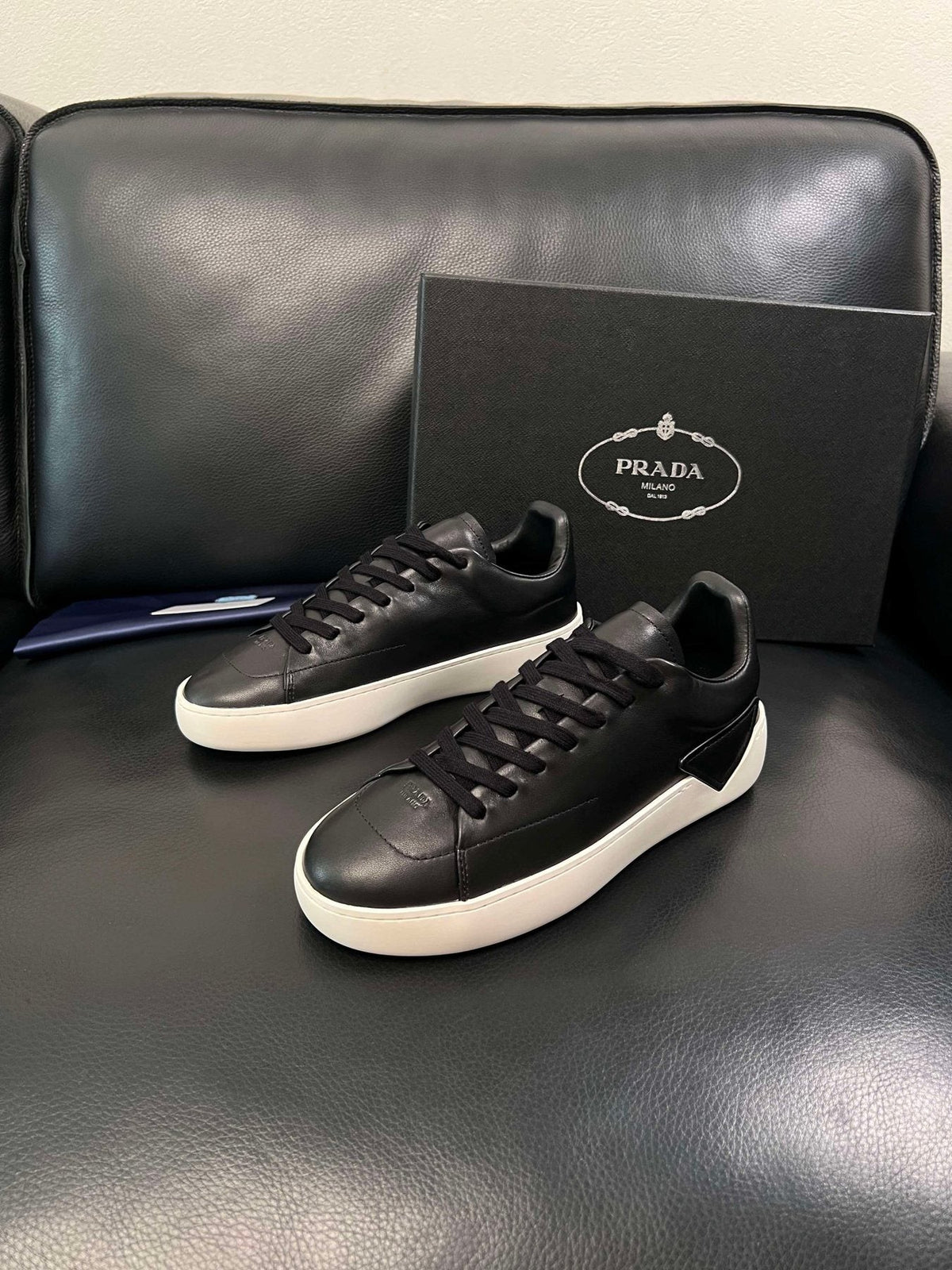 Prada Low-Top Leather Sneakers — side