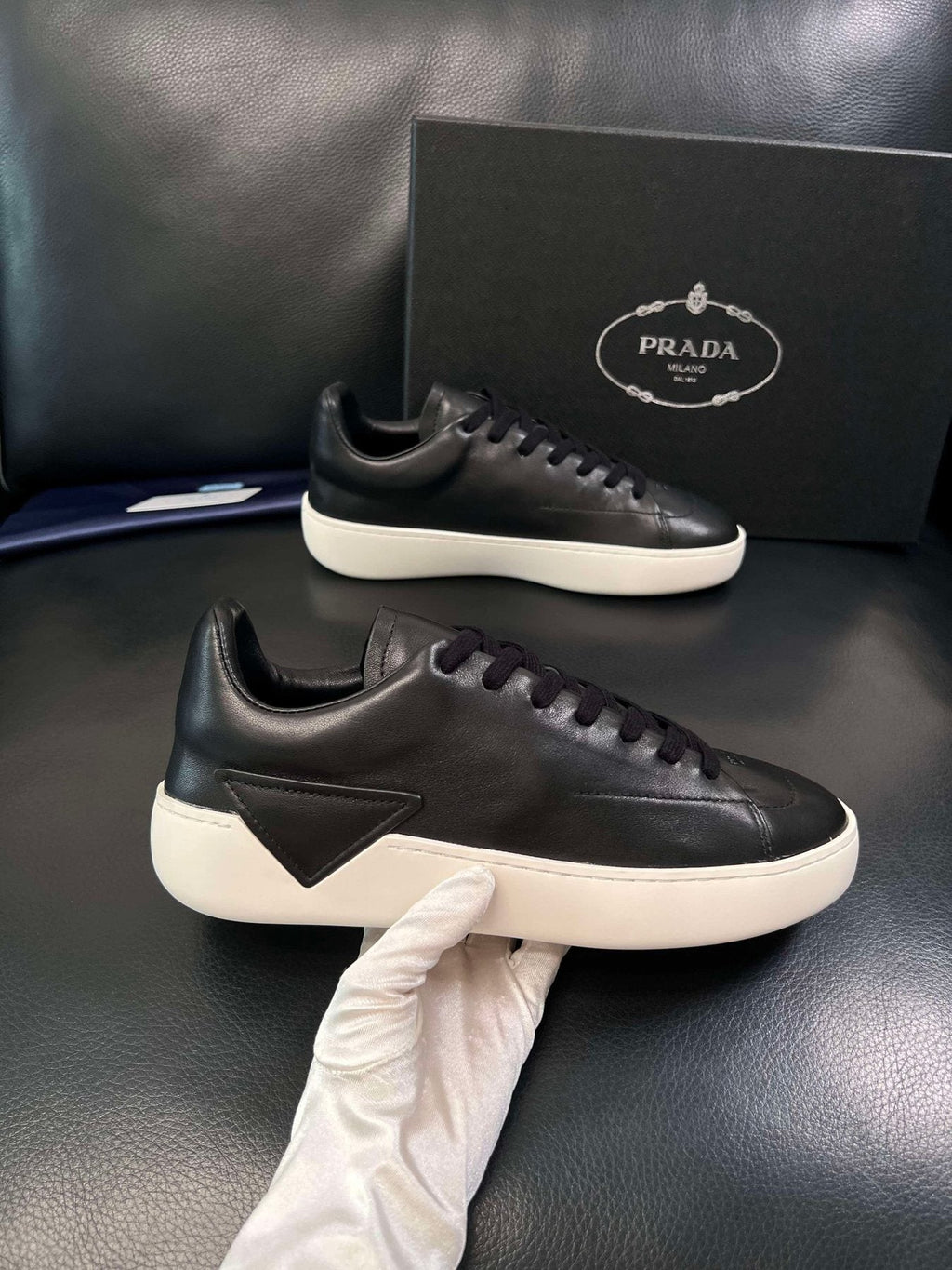 Prada Low-Top Leather Sneakers — side