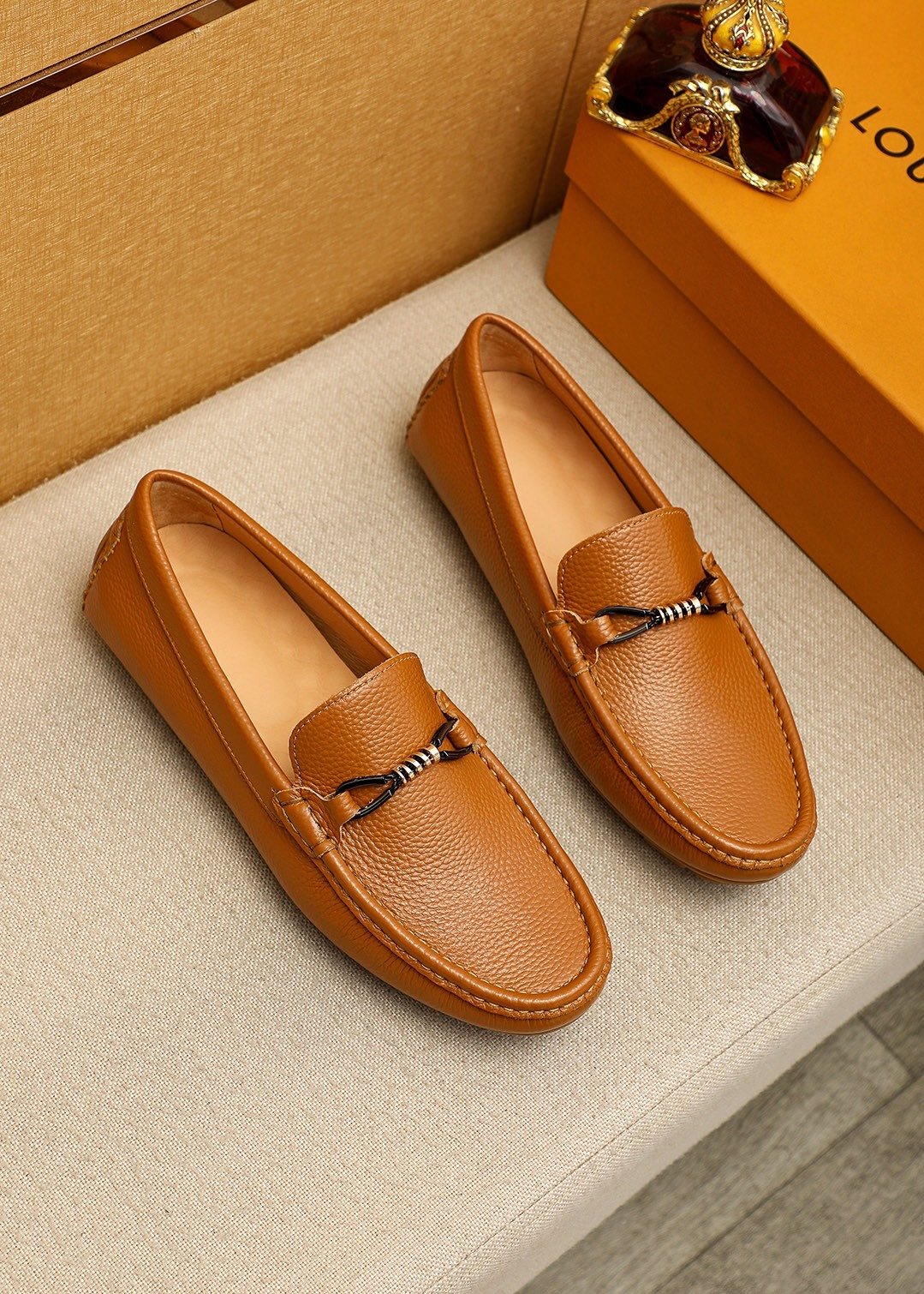 Louis Vuitton Pebble-Grain Bit Loafers — front